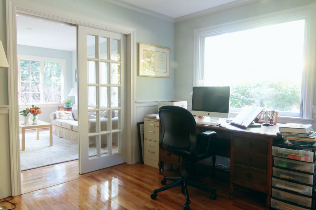 Mr W's former office was dark and cut off from the rest of the house. In the new home, he can enjoy a great view, while being centrally located. Now he can be properly distracted by all the lovely things and people around him. Wall color: Comfort Gray.